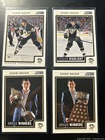 All four Evgeni Malkin Score cards laid out