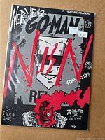Front cover of Go-Man comic in plastic sleeve