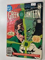 Front cover of Green Lantern #128 sealed in bag