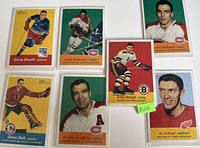 Front view of seven sleeved Topps Heritage NHL cards