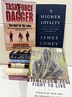 Group shot showing all 8 books including visible titles