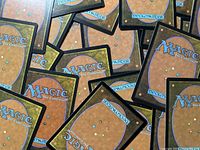 Scattered view of card backs showing official Magic: The Gathering design