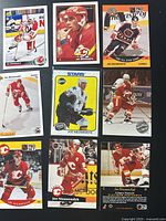 Grid of nine Joe Nieuwendyk hockey cards laid out