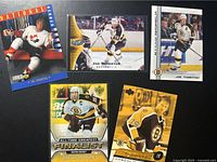 Five Joe Thornton cards laid out