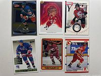 All six cards laid out – three Flames, two Rangers, one illustrated portrait