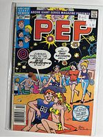 Front cover of Pep Comics #589 in protective sleeve