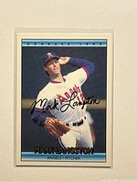 Front of 1992 Donruss Mark Langston card showing action pose and printed autograph