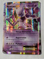 Front full view of Mewtwo EX card showing artwork and holographic surface