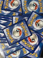 Pile of Pokémon card backs