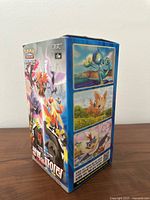 Front/side artwork of the empty booster box