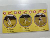 Front view of entire three-card panel showing images and numbering 11A-11C