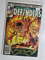 Front cover view of The Defenders #116 comic in bag.