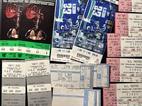 Mixed ticket stubs spread out showing variety