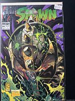 Front cover of Spawn issue 31 in protective sleeve