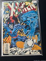 Front cover in bag with full artwork visible