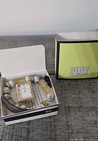 Boxed KEEP Collective watch head with straps shown