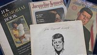 Group shot of all four Kennedy items showing front covers