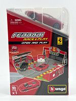 Front view of sealed Bburago Ferrari Race & Play set packaging