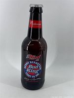 Front view showing printed Kenny Bernstein “Bud King” graphic and red neck label