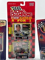 Front of sealed Winner’s Circle Jeff Gordon Jurassic Park 1/64 die-cast on card
