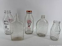 Group shot of all five glass bottles