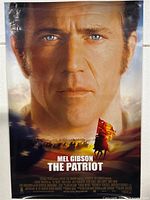Full view of The Patriot movie poster hanging on wall