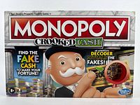 Front of sealed Monopoly Crooked Cash board game box