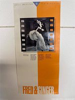 Full front view of the AMD & MMI Fred & Ginger poster hanging on wall