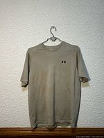 Front view tan camo Under Armour t-shirt