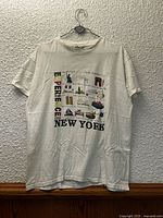 Front view of white Experience New York T-shirt