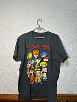 Full view of Ed, Edd n Eddy graphic T-shirt on hanger