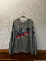 Full front view of grey CCM Montreal Canadiens sweatshirt