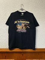 Front view of T-shirt hanging displaying entire graphic