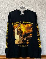 Front view showing artwork and sleeve prints