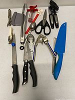 All utensils and knives arranged on surface