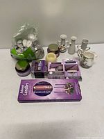 Overview showing all candles, vases and Royal Albert creamer