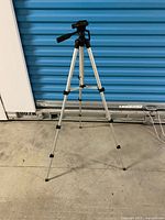 Full view of aluminum tripod extended