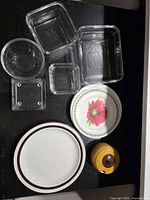 overview of all glass containers, plates, coaster, and sugar bowl