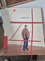 Front cover showing title and image of artist