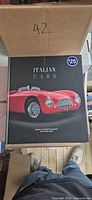 Front cover showing title Italian Cars and red sports car image