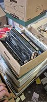 Box of assorted large-format art books