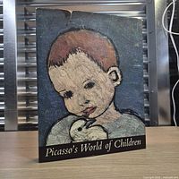 Front cover showing title and child portrait artwork