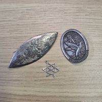 Front view of all three sterling pieces