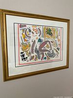 Straight-on view of framed serigraph showing artwork, frame and mat