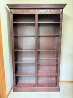 Front view showing full height bookcase and shelving layout