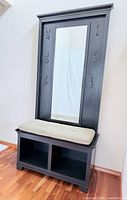 Full view of hall tree showing mirror, hooks, bench, cubbies