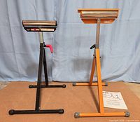 Both pedestal roller stands side by side with manual visible
