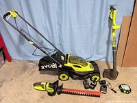 Group shot showing mower, hedge trimmer, string trimmer, batteries, chargers, line spool, blade cover