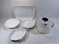 Group shot: platter, three porcelain dishes, salad spinner