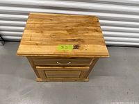 Top view showing pine wood grain, stain mark, overall shape